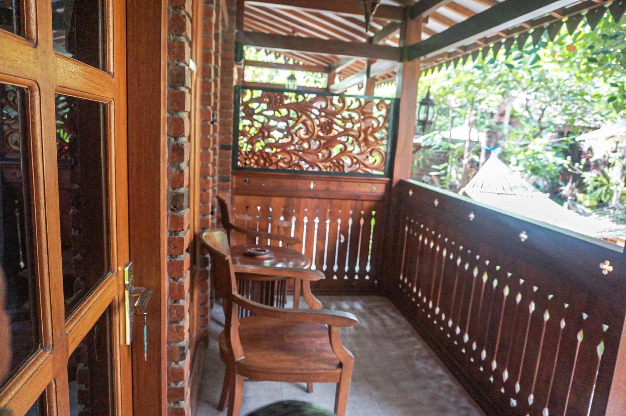 The Wisma Pulau Merah Pasanggaran Phòng bức ảnh